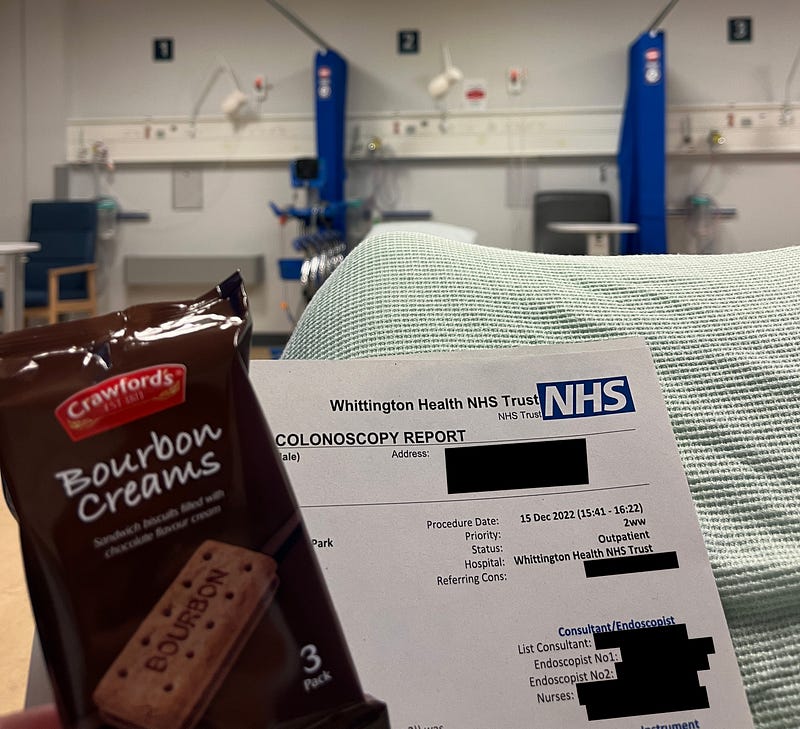Picture of me in my recovery bed at the Whittington hospital with some Bourbon biscuits.