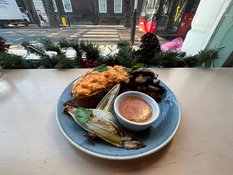 Eggs, mushrooms on toast at Catalyst Cafe in London.